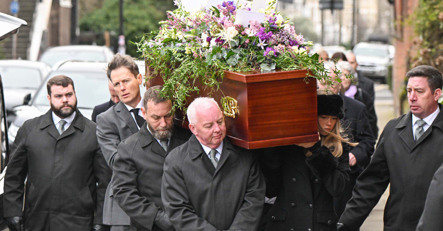 Derek Draper's coffin being carried into church