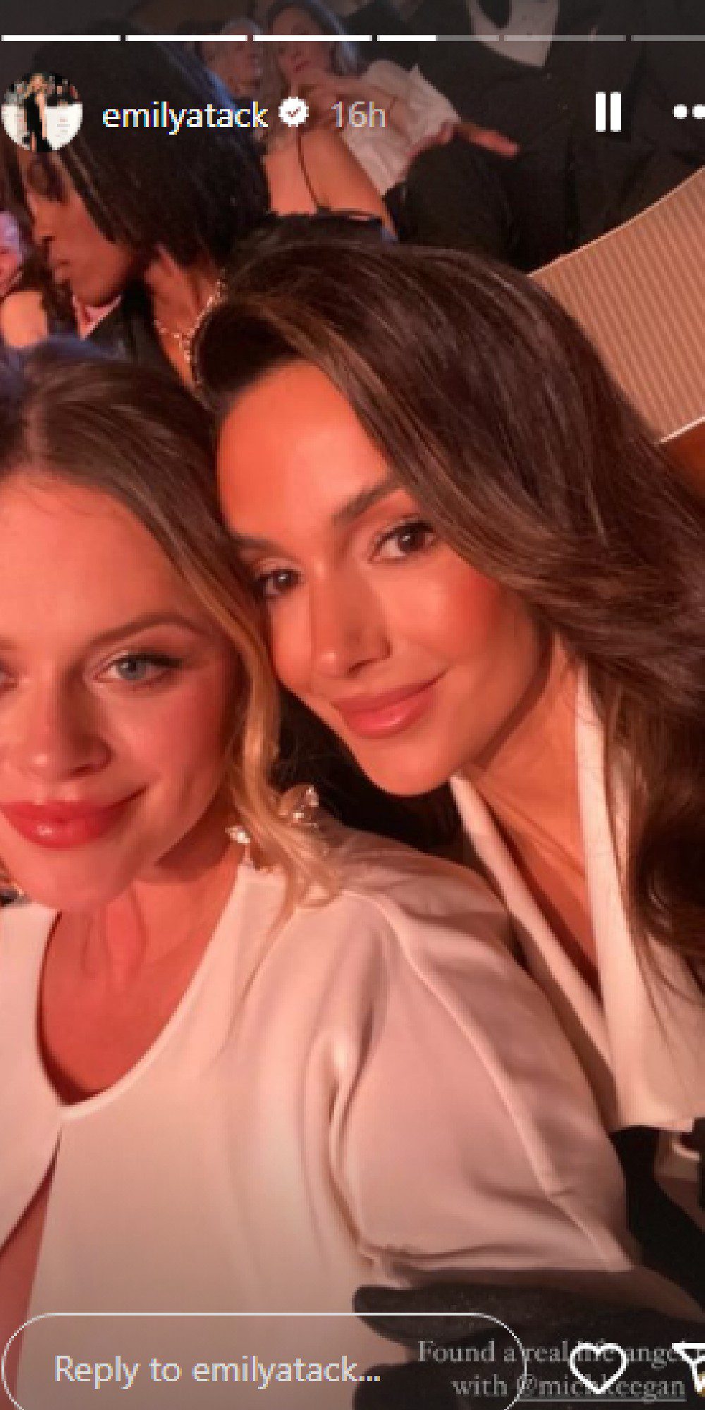 Emily Atack and Michelle Keegan smiling at BAFTAs