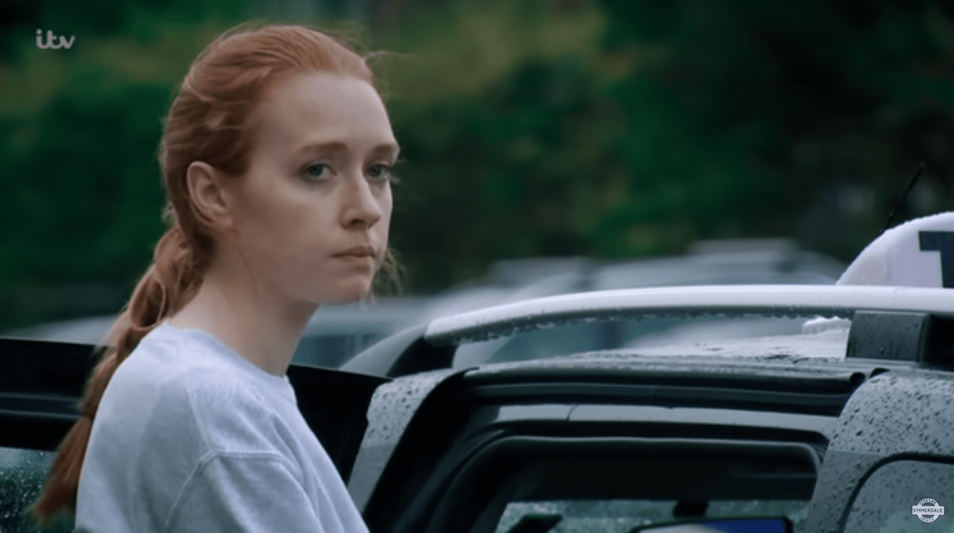 Emmerdale's Chloe Harris looks sad yet determined as she gets into the car to leave