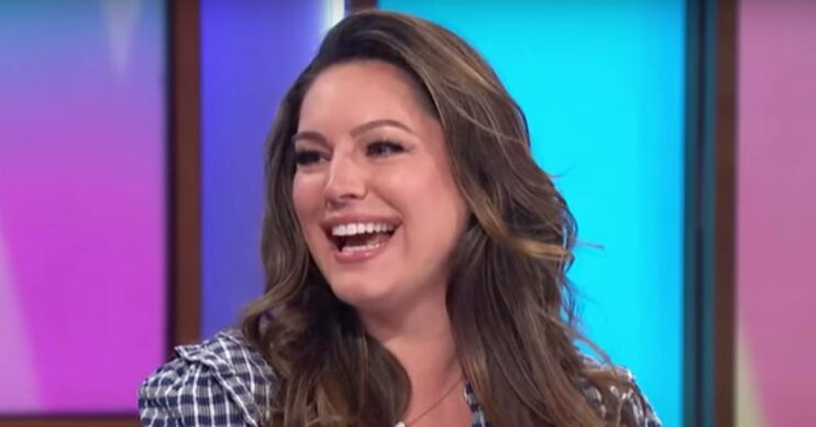 Kelly Brook smiles