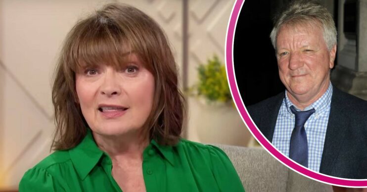 Lorraine Kelly looks into the camera, husband Steve Smith smiles