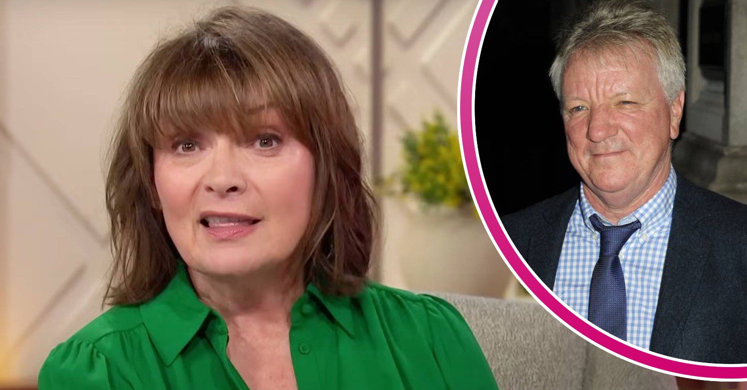 Lorraine Kelly looks into the camera, husband Steve Smith smiles