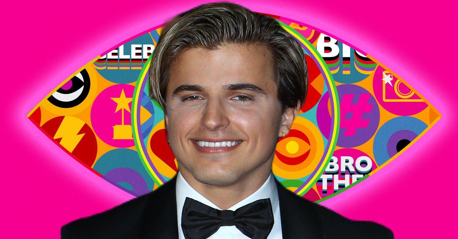 Strictly star Nikita Kuzmin smiling in front of CBB logo