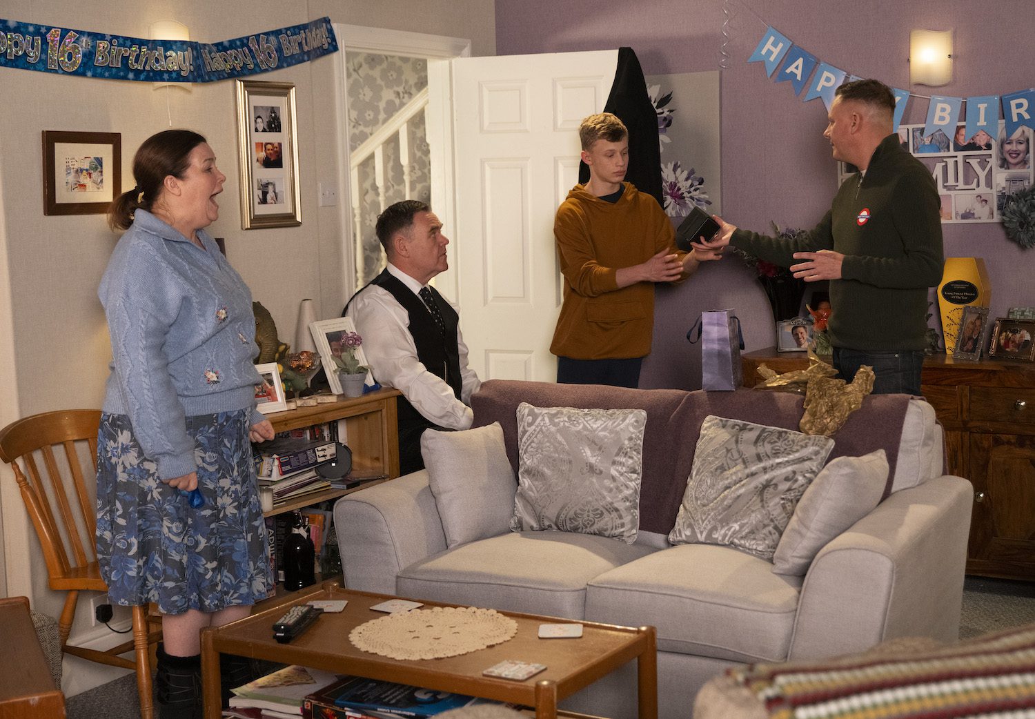 Sean, Dylan and the family sit around at home on Corrie