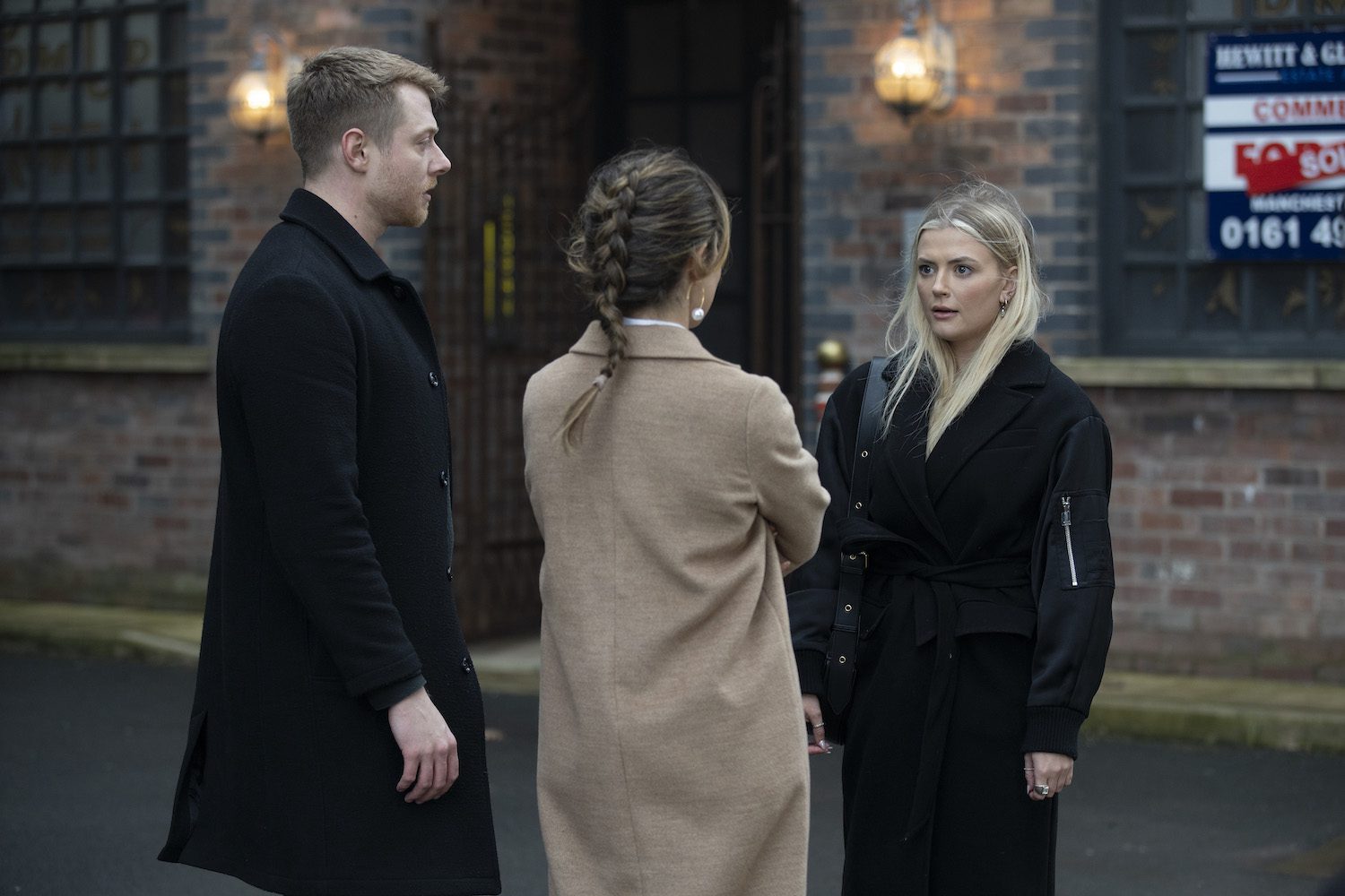 Daniel, Daisy and bethany talk in the street on Corrie