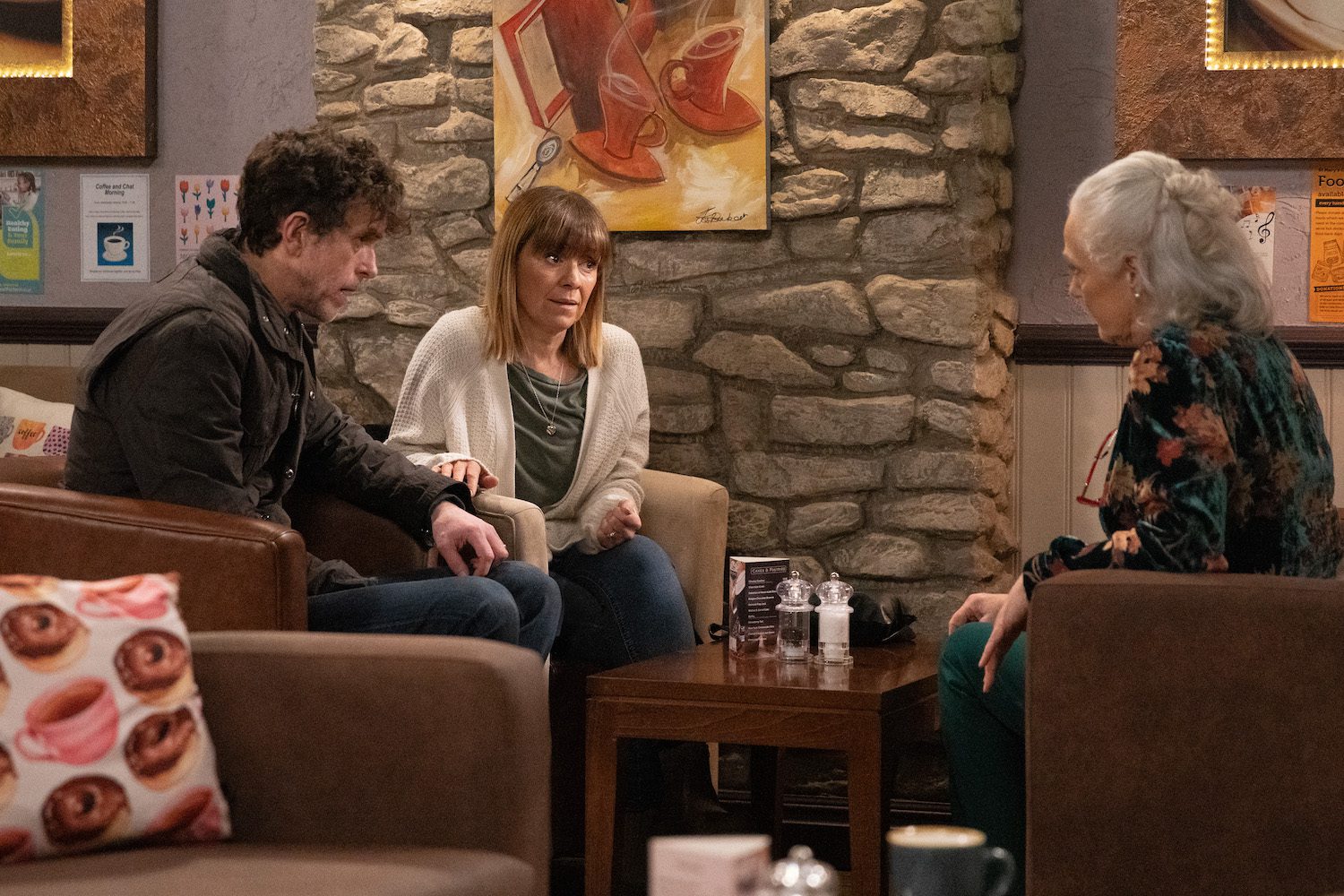 Rhona talking to Mary and Marlon on Emmerdale