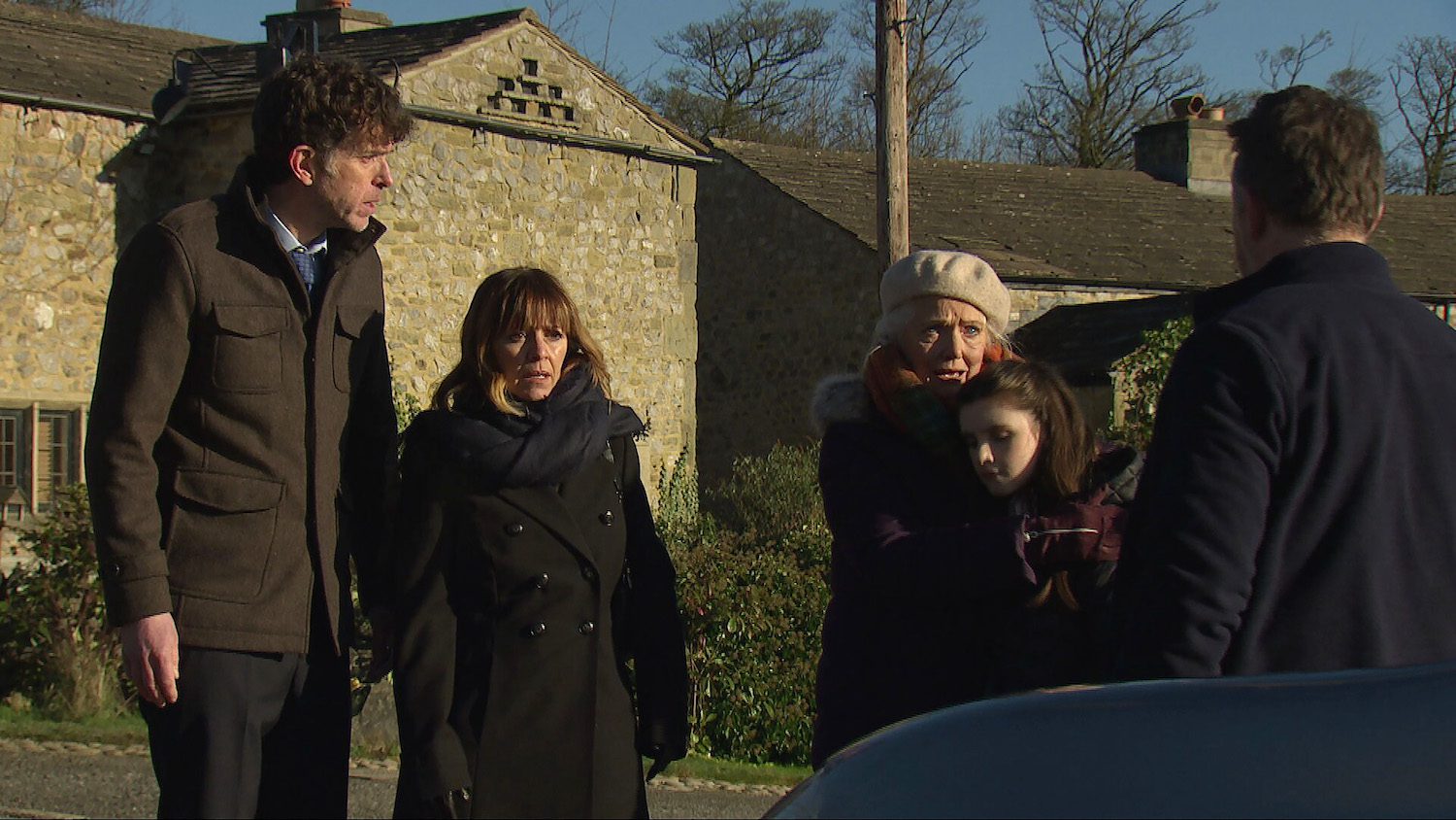 Gus talking to Marlon, Mary, Rhona and April