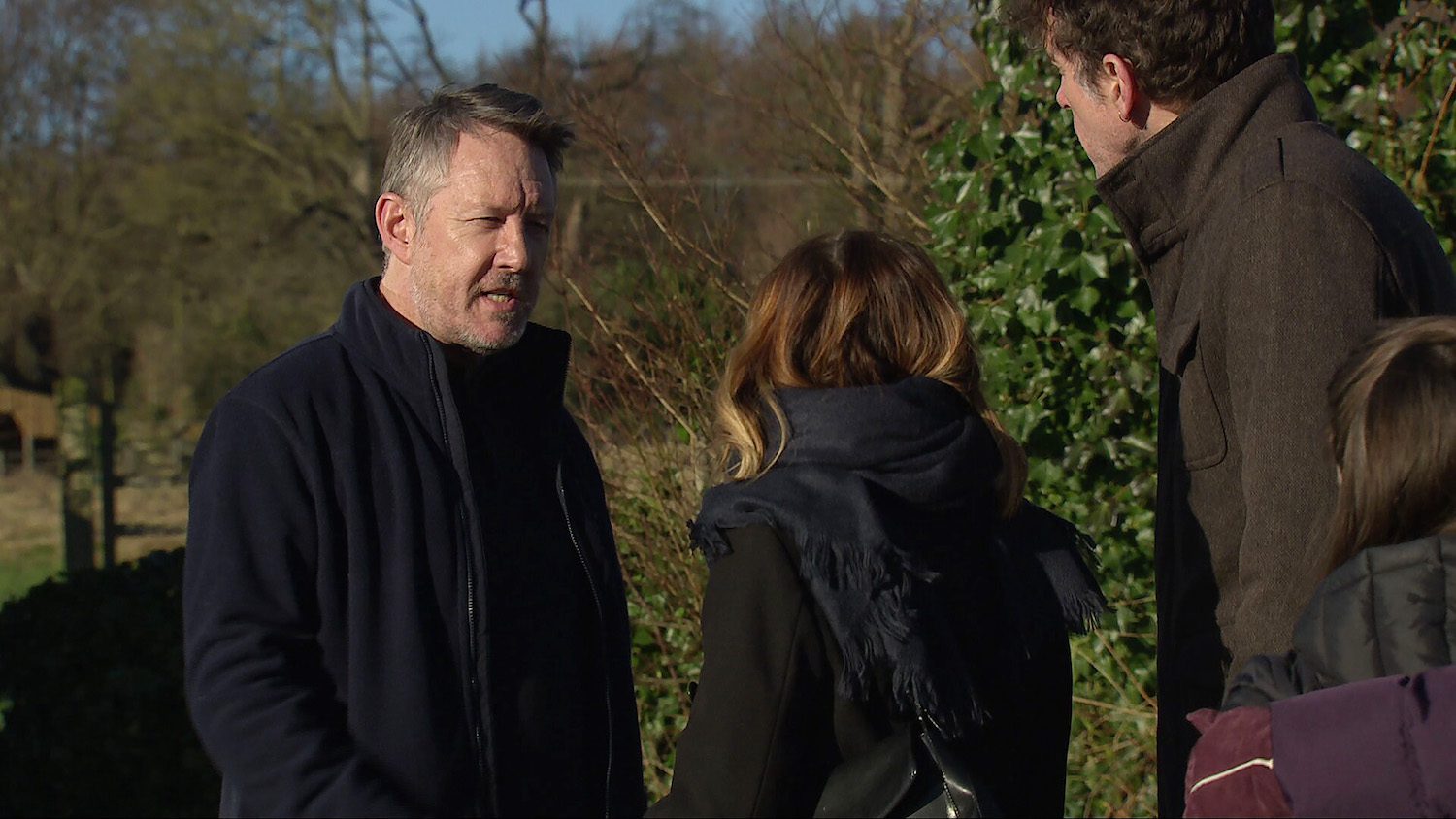 Gus looks angry on Emmerdale