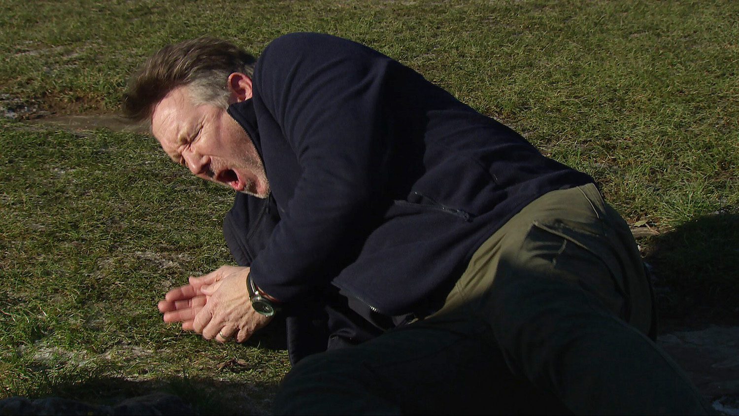 Gus on the floor, injured on Emmerdale