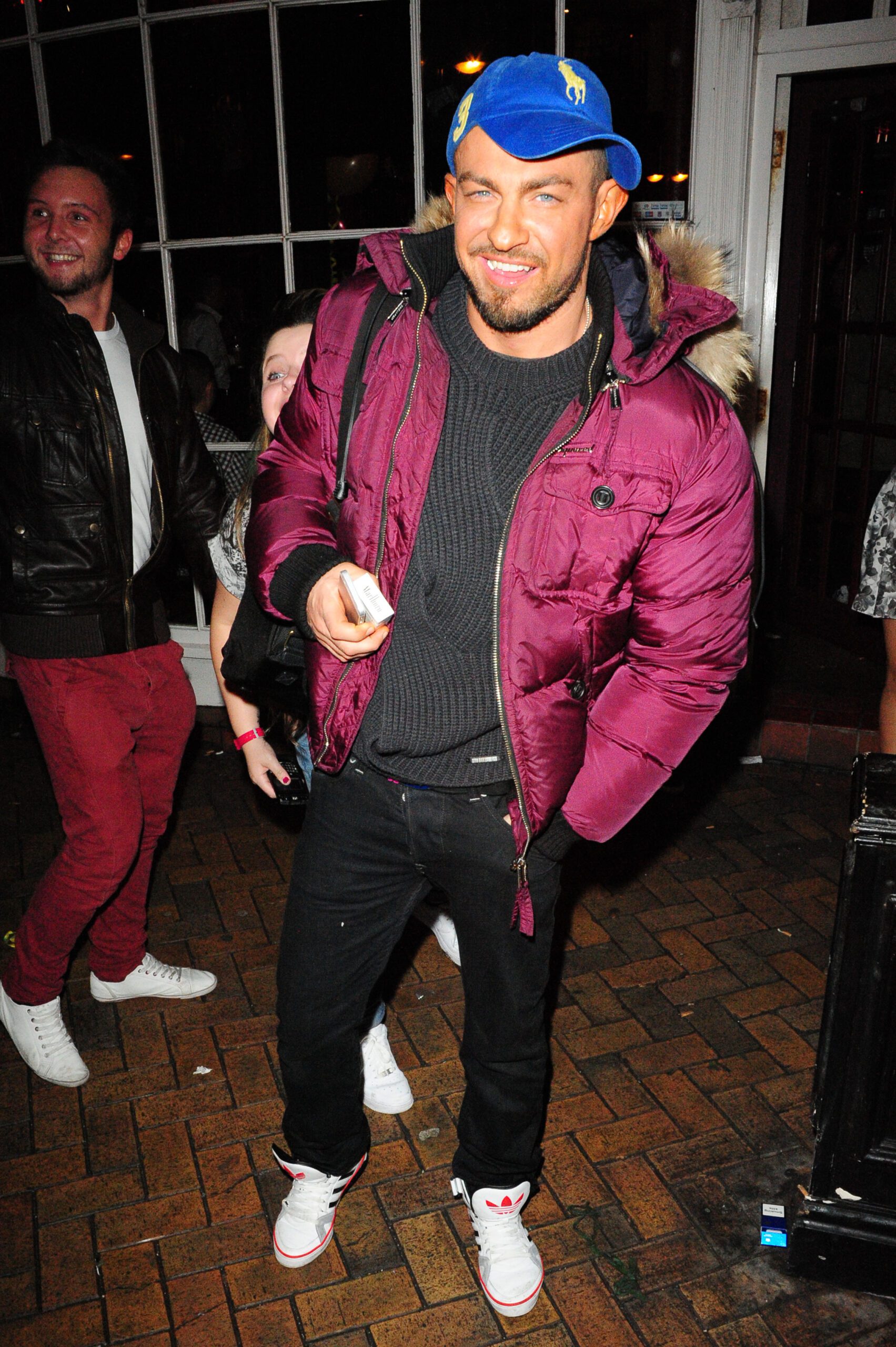 Robin Windsor wearing a blue hat and pink coat