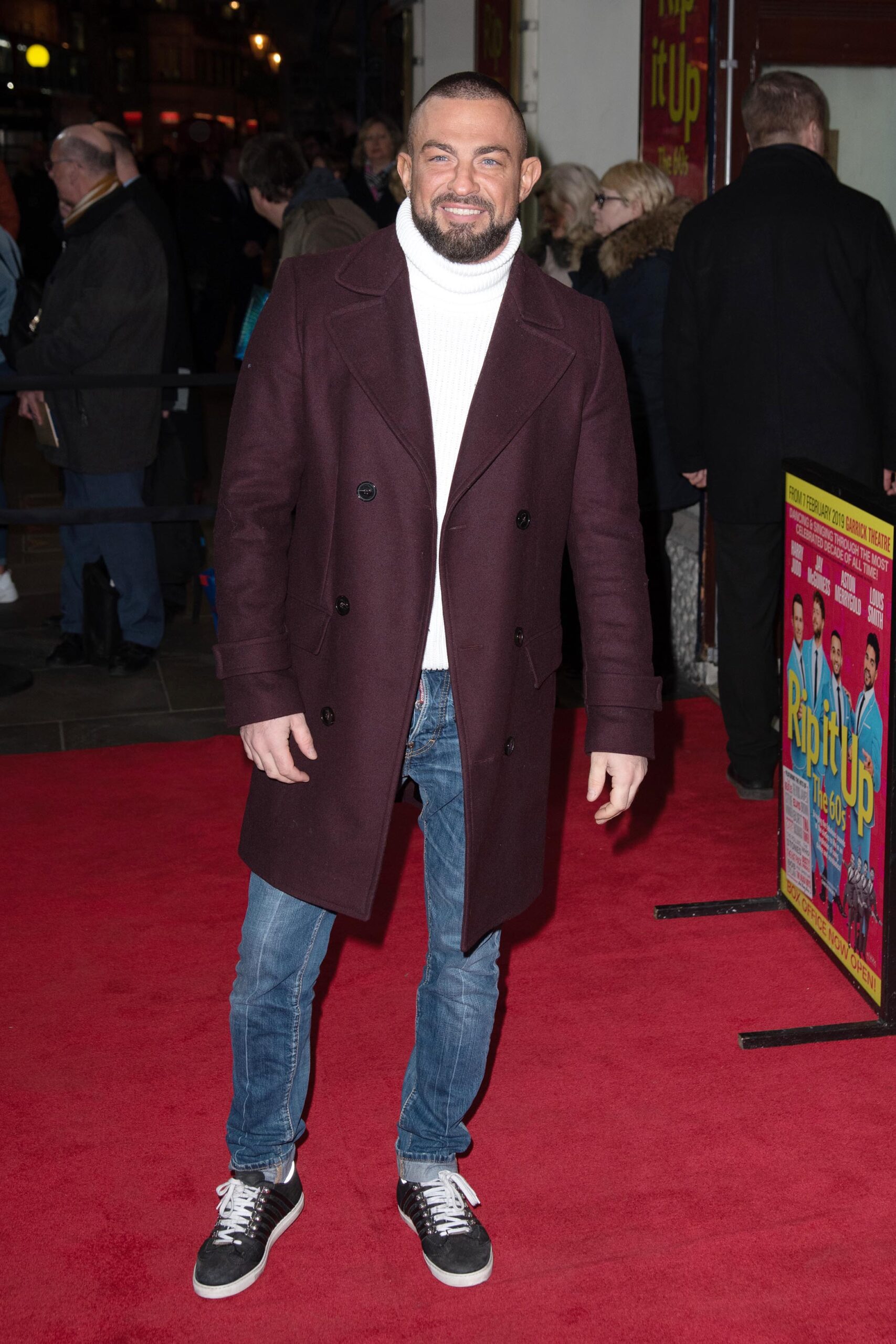 Robin Windsor at an event in a burgundy coat