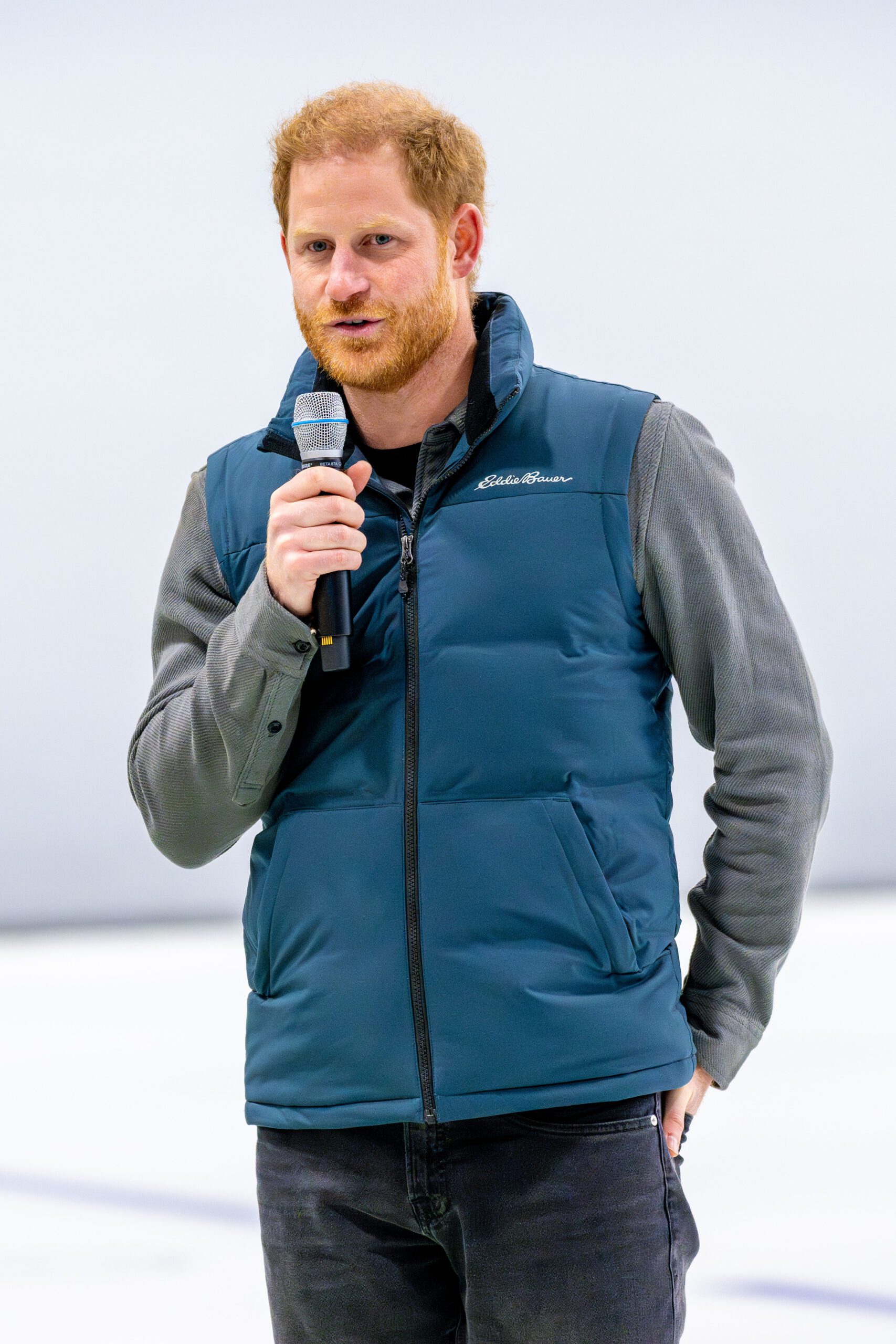 Prince Harry speaking into a microphone