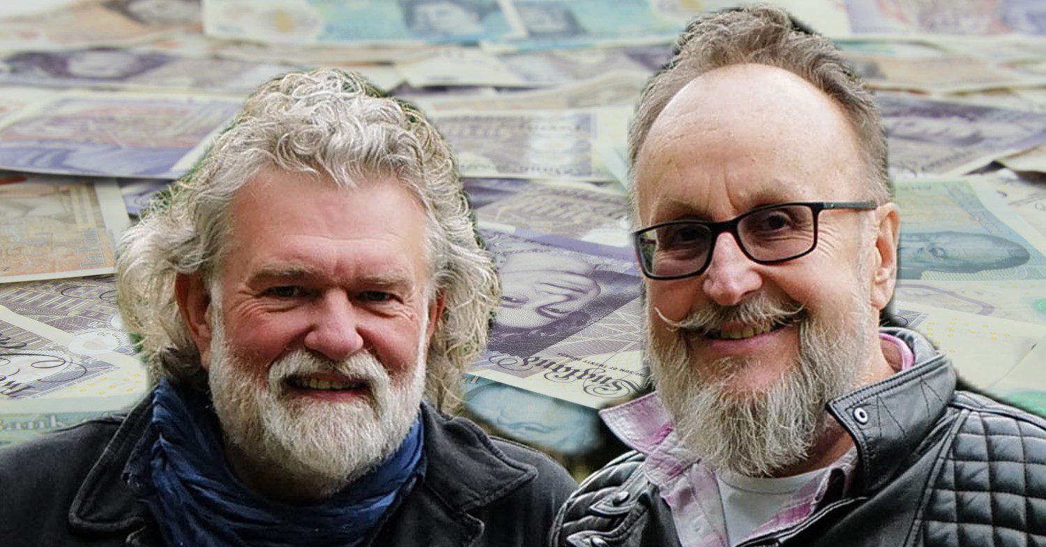 Si King and Dave Myers smiling against a money backdrop