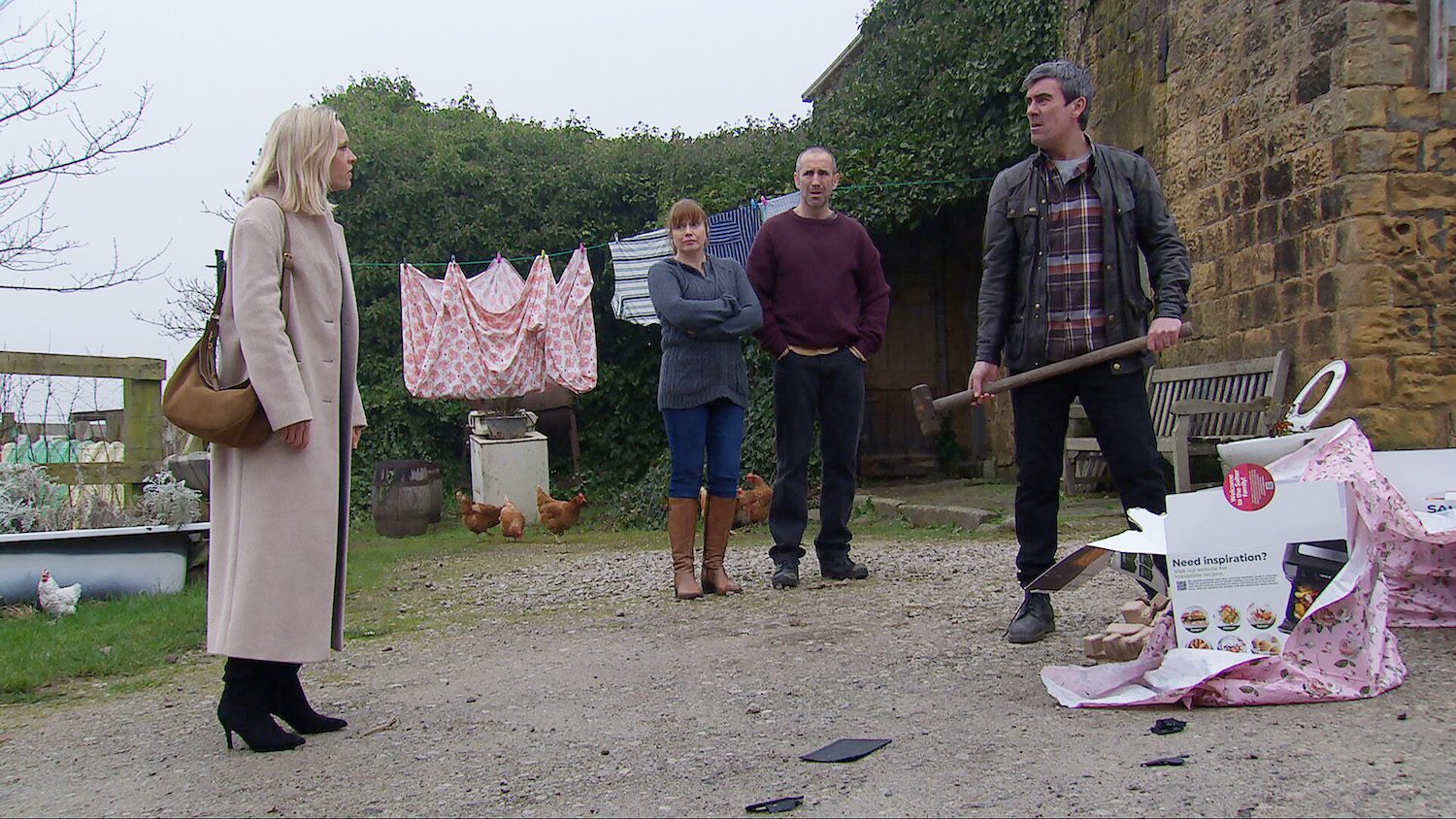 Ruby is talking to an angry Cain outside as Lydia and Sam look on