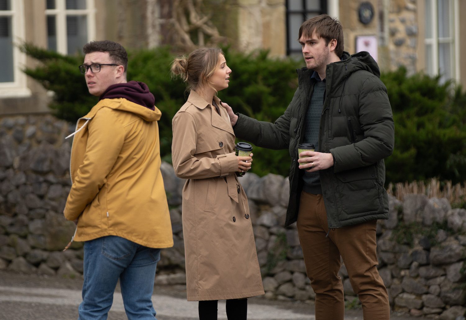 Belle and Tom look worried as they talk to Vinny outside