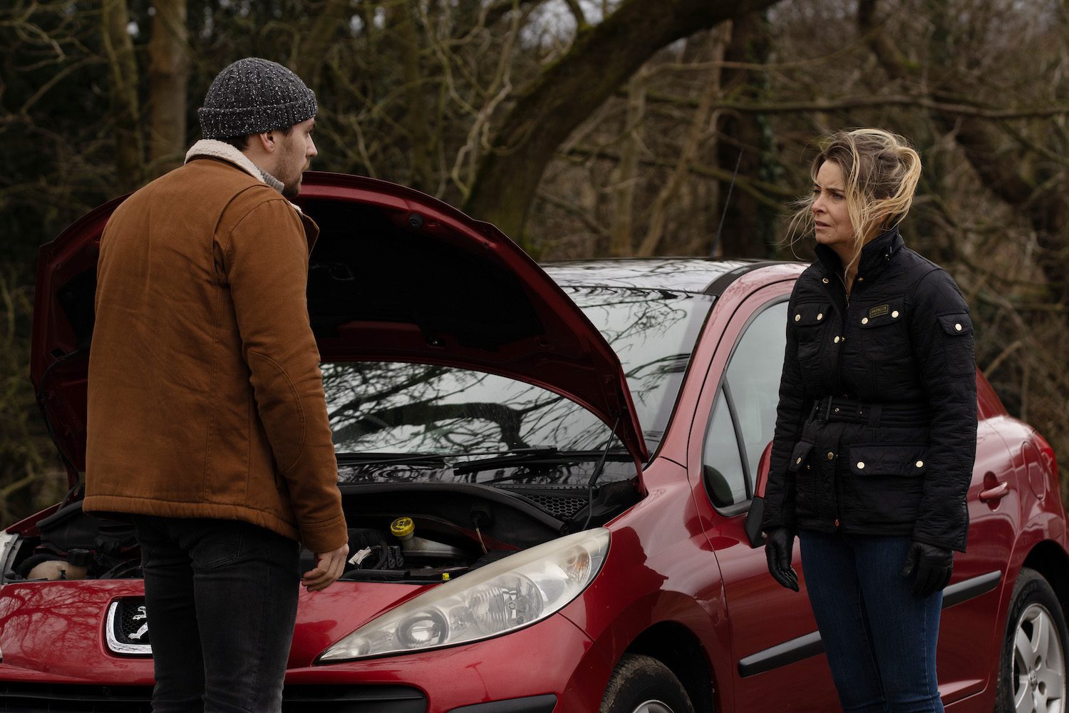 Emmerdale's Charity and Mack are talking outside of a broken down car