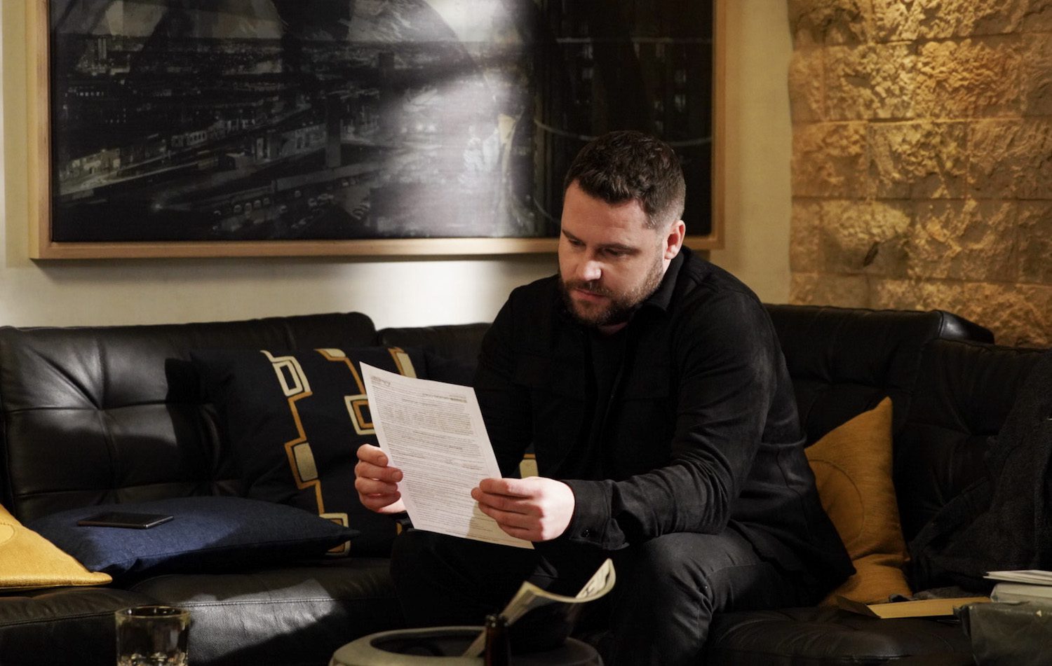 Aaron Dingle looks grim as he reads his letter