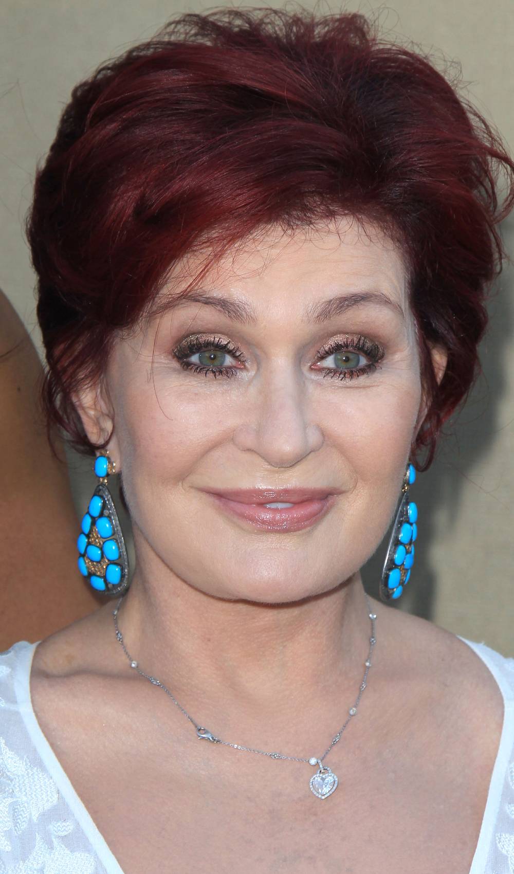 Sharon Osbourne smiles in 2013