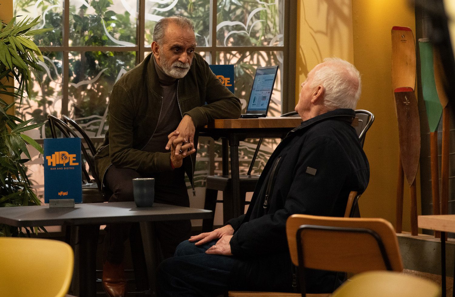 Amit talking to Pollard on Emmerdale