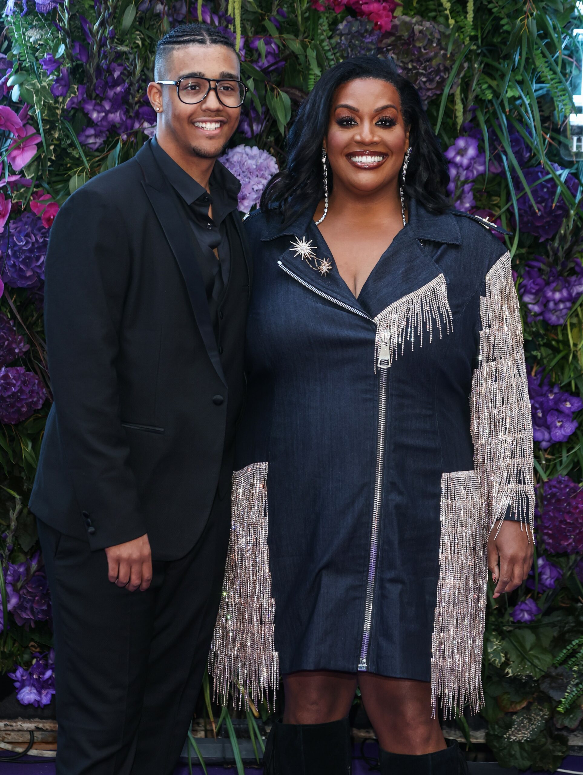 Alison Hammond smiling with her son Aidan at event