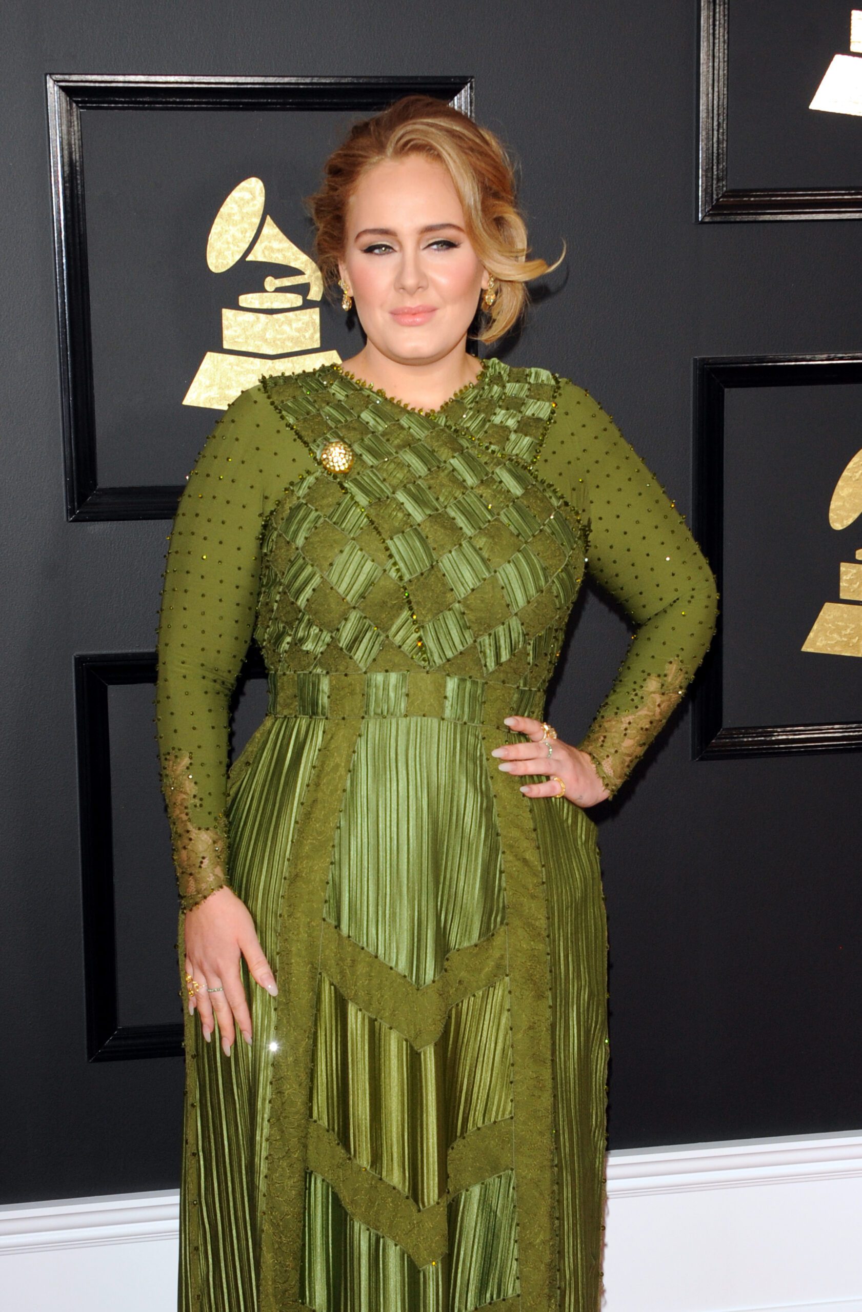 Adele smiling on the red carpet