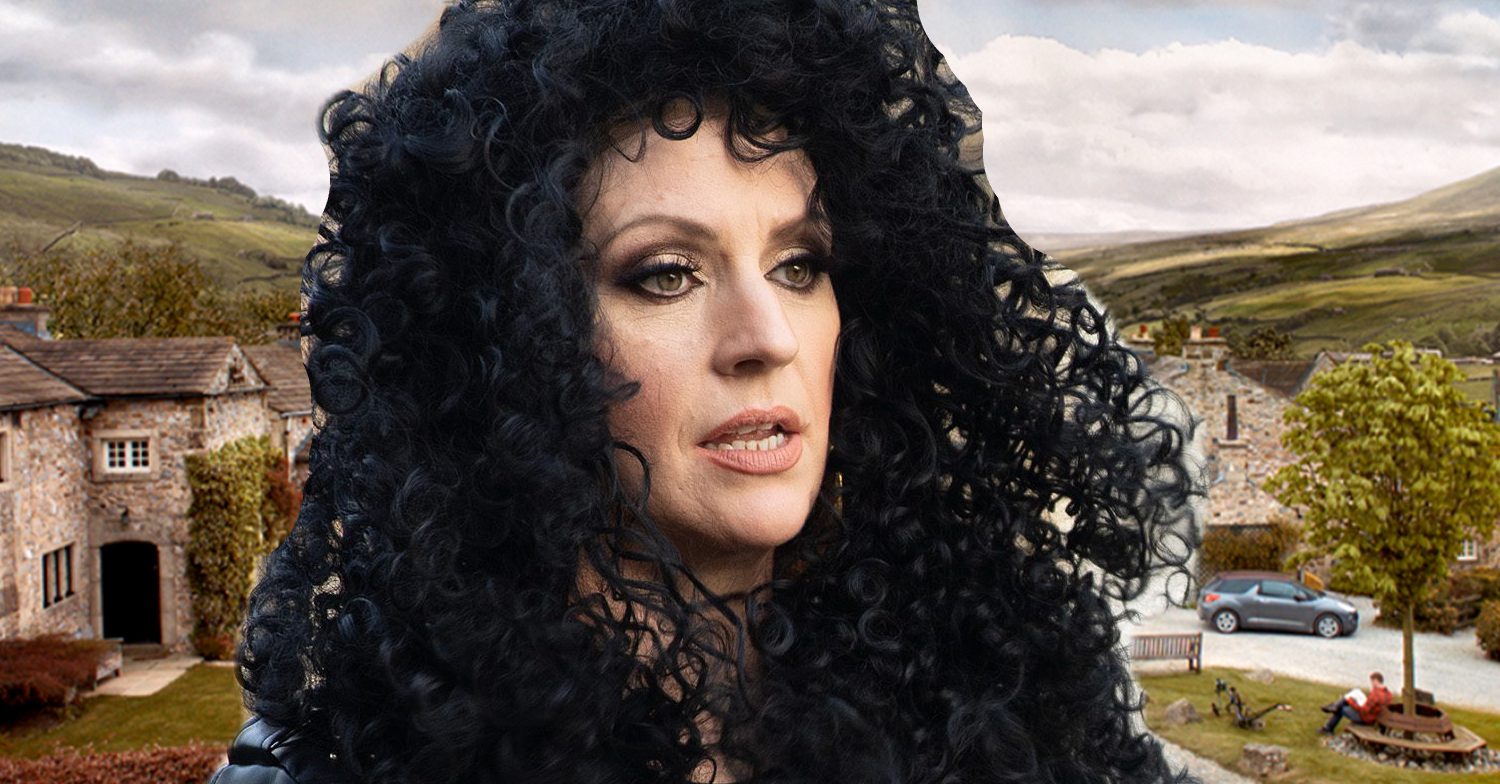 Emmerdale's Kerry in a Cher wig, the background of the Dales