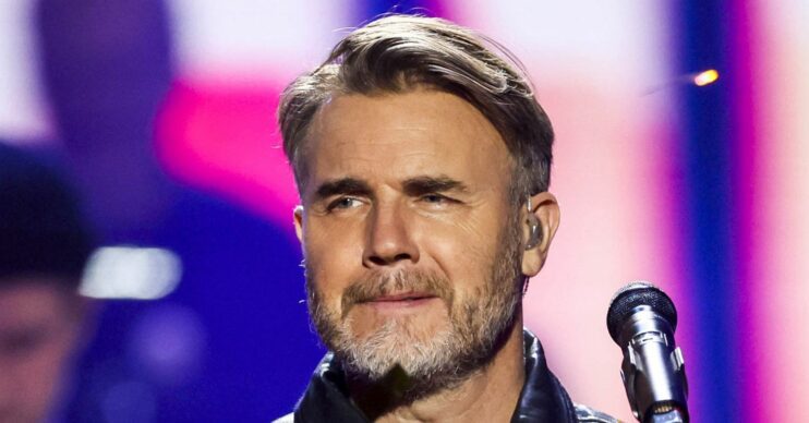Gary Barlow performing on stage