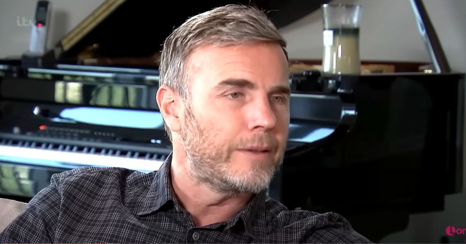 Gary Barlow looking in front
