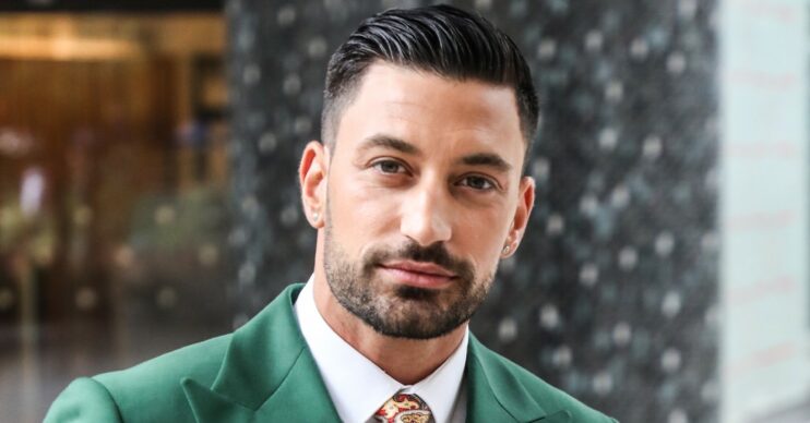Giovanni Pernice looking at the camera outside TV studios