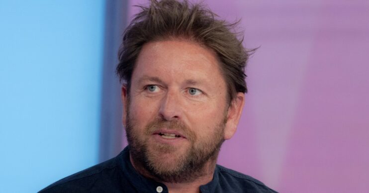 James Martin speaking against a pink background