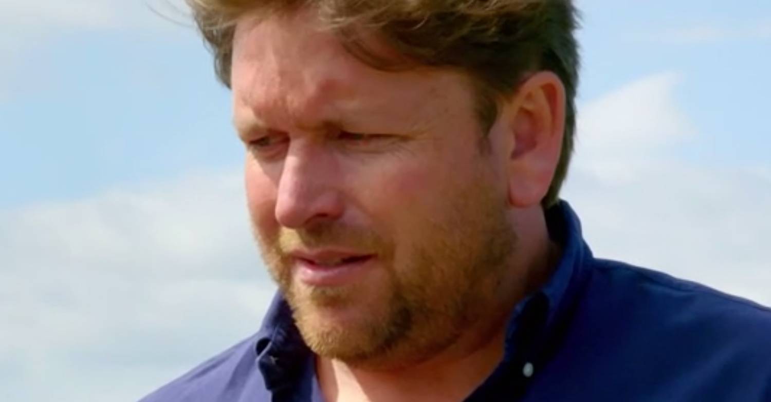 James Martin looks downwards