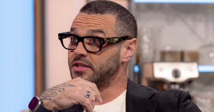 Matt Willis looking serious during a TV interview