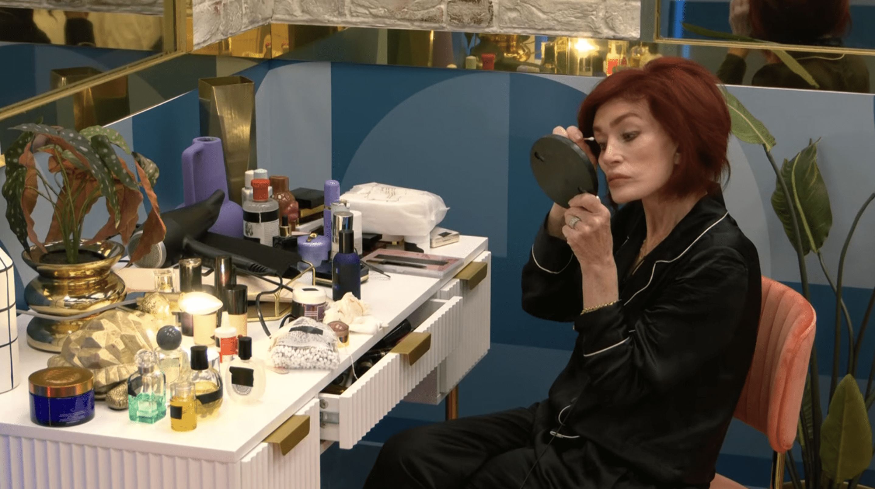 Sharon Osbourne doing her makeup in the Celebrity Big Brother house 