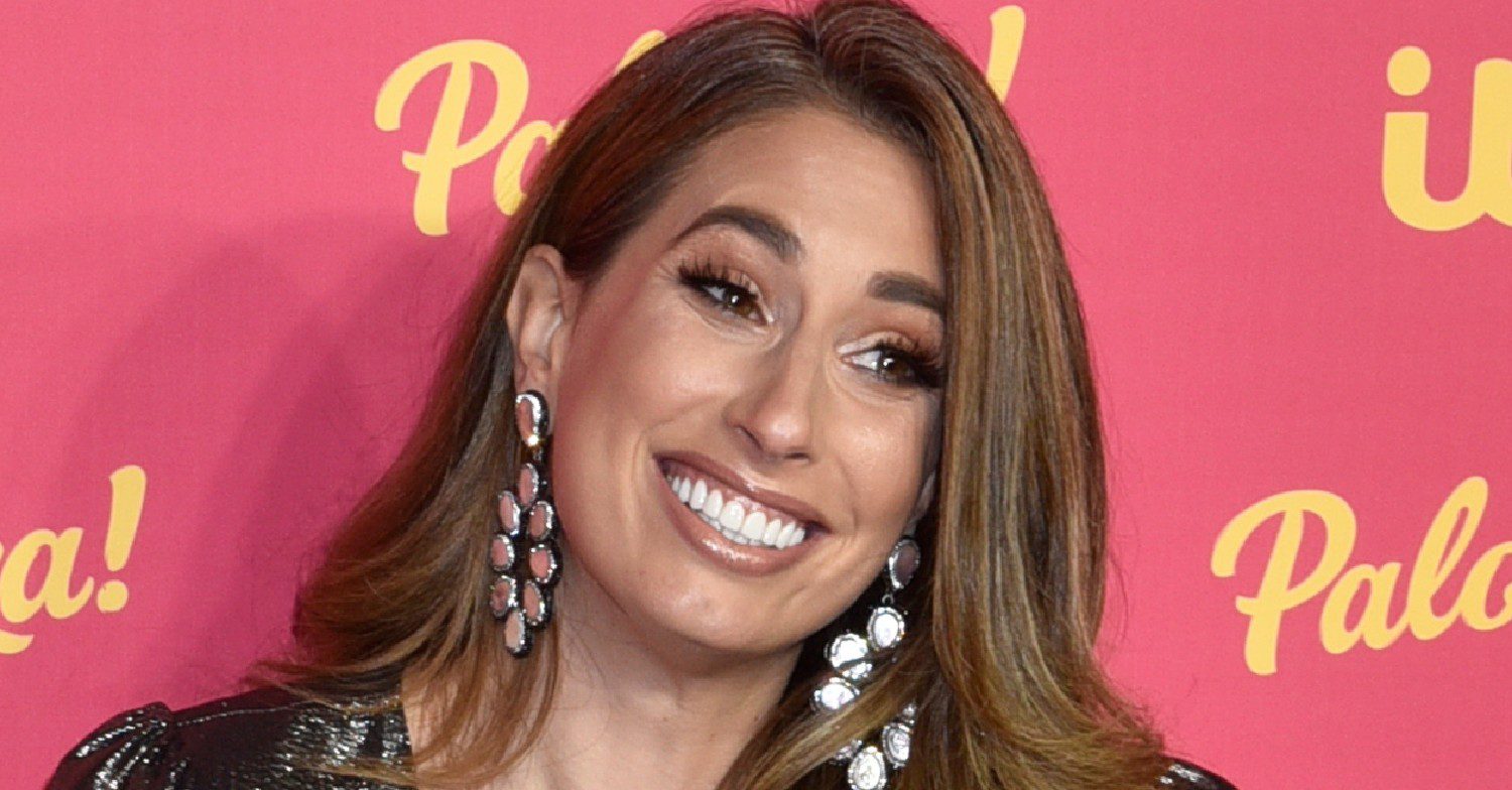 Stacey Solomon posing and smiling