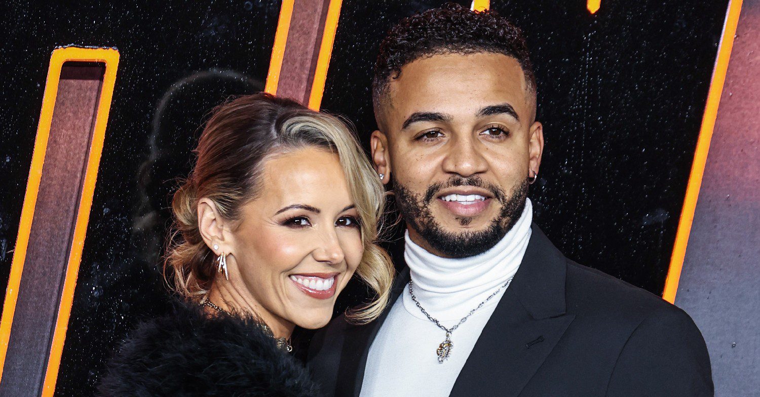 Aston Merrygold and his wife smiling