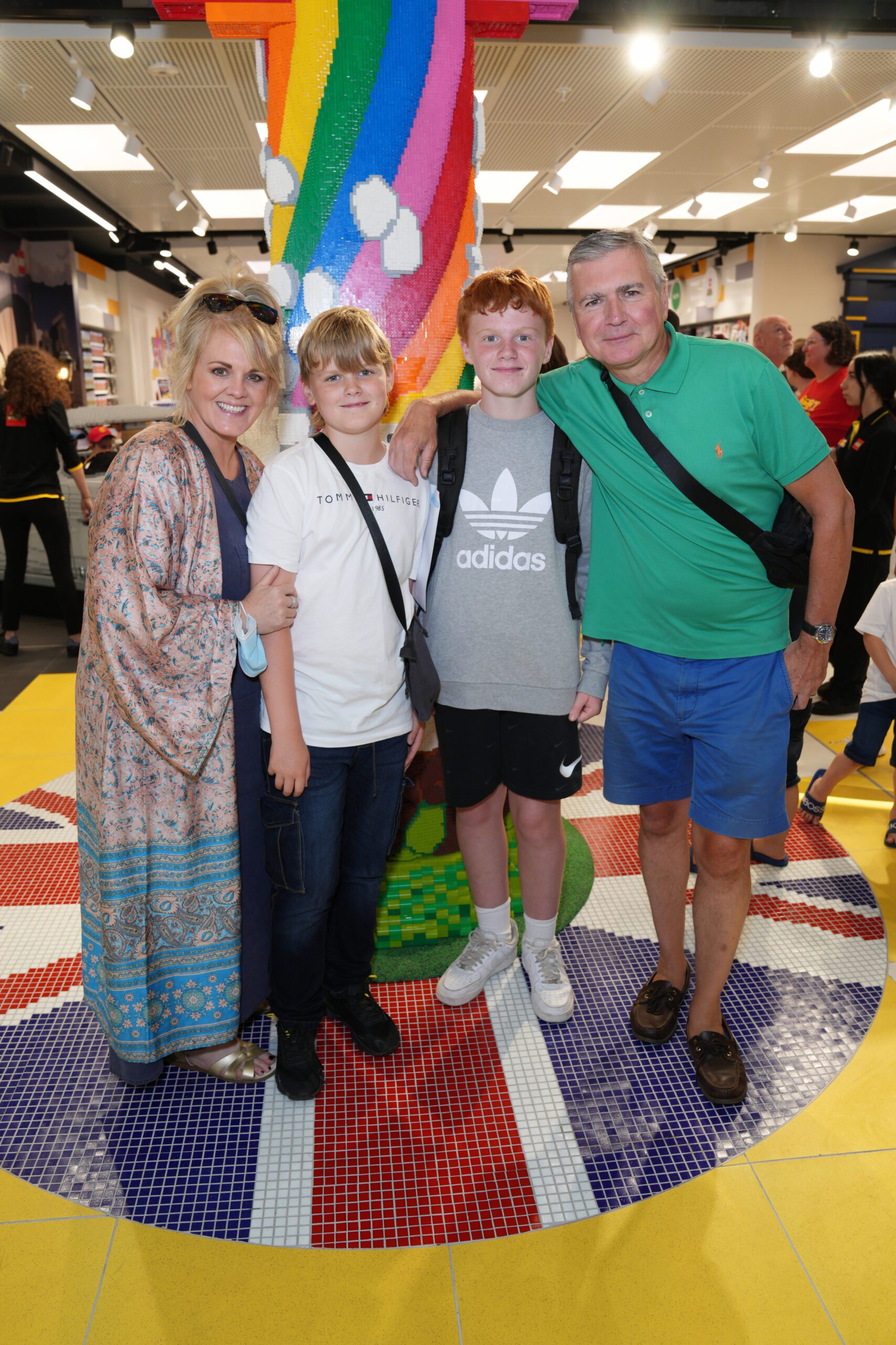 Sally Lindsay with her husband and two sons at Lego store