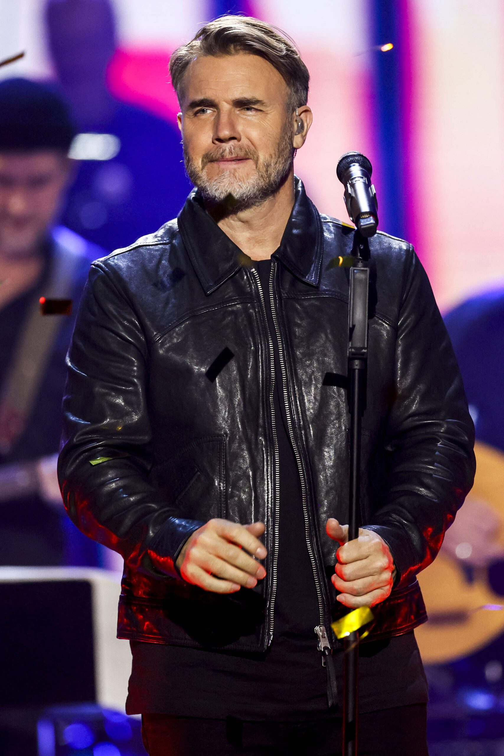 Gary Barlow performing on stage