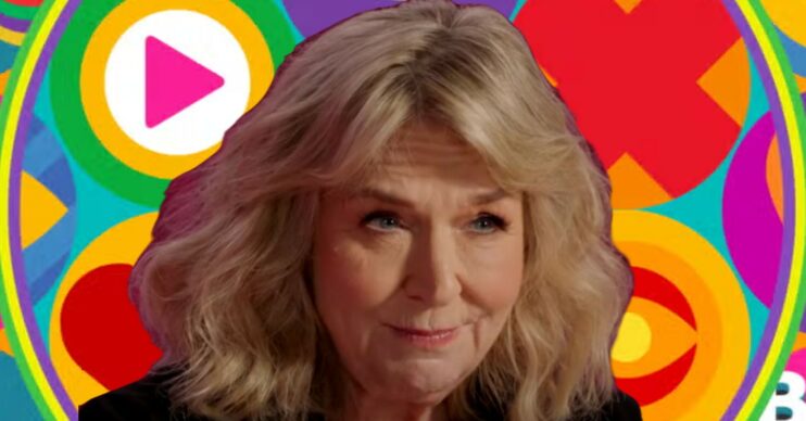 Fern Britton in front of Celebrity Big Brother logo