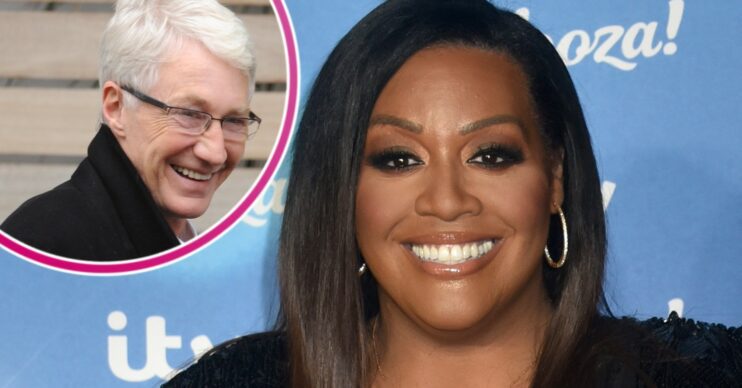Alison Hammond smiling on a red carpet with Paul O'Grady