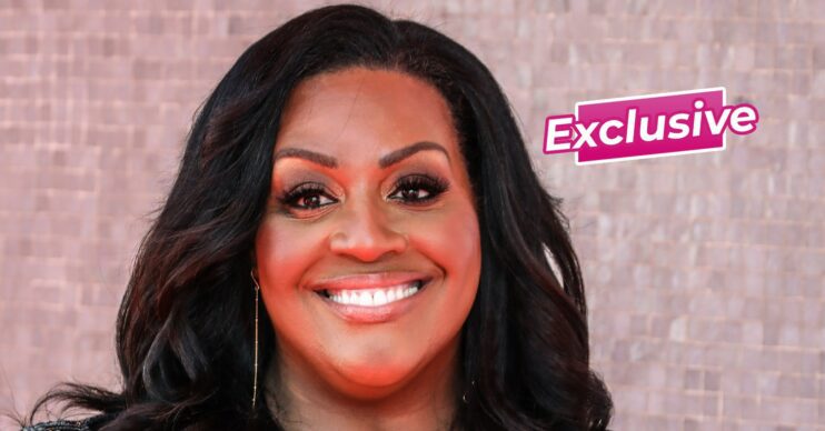 Alison Hammond smiling against a pink background