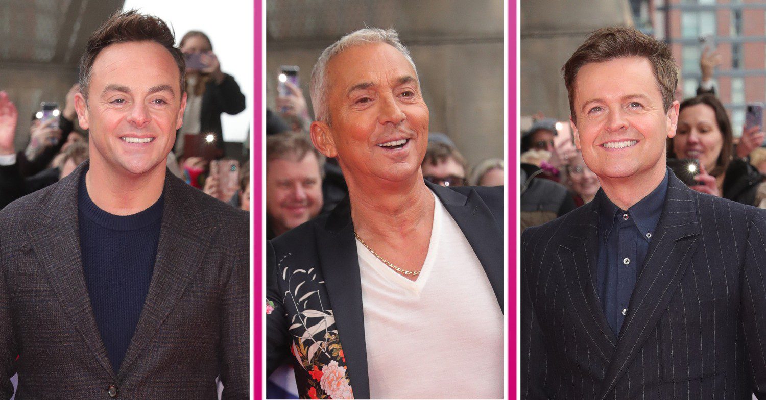 Bruno Tonioli waving at camera on BGT auditions red carpet, beside smiling Ant and Dec