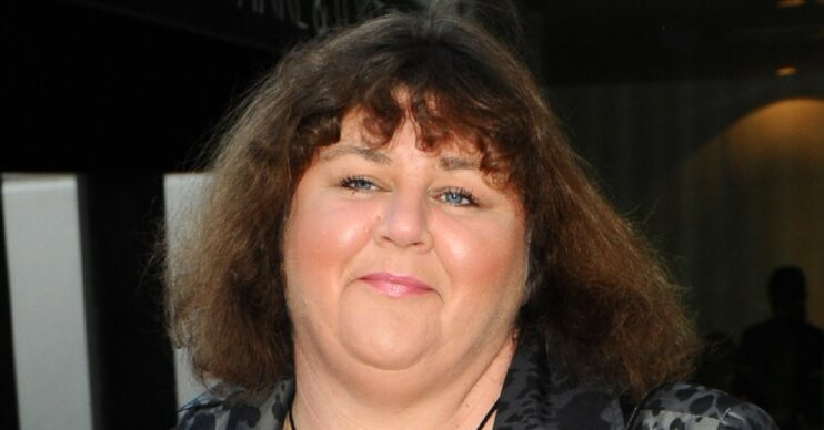 Cheryl Fergison looking straight faced on the red carpet