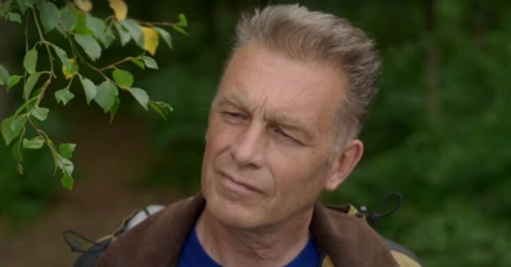 Chris Packham frowning whilst outside