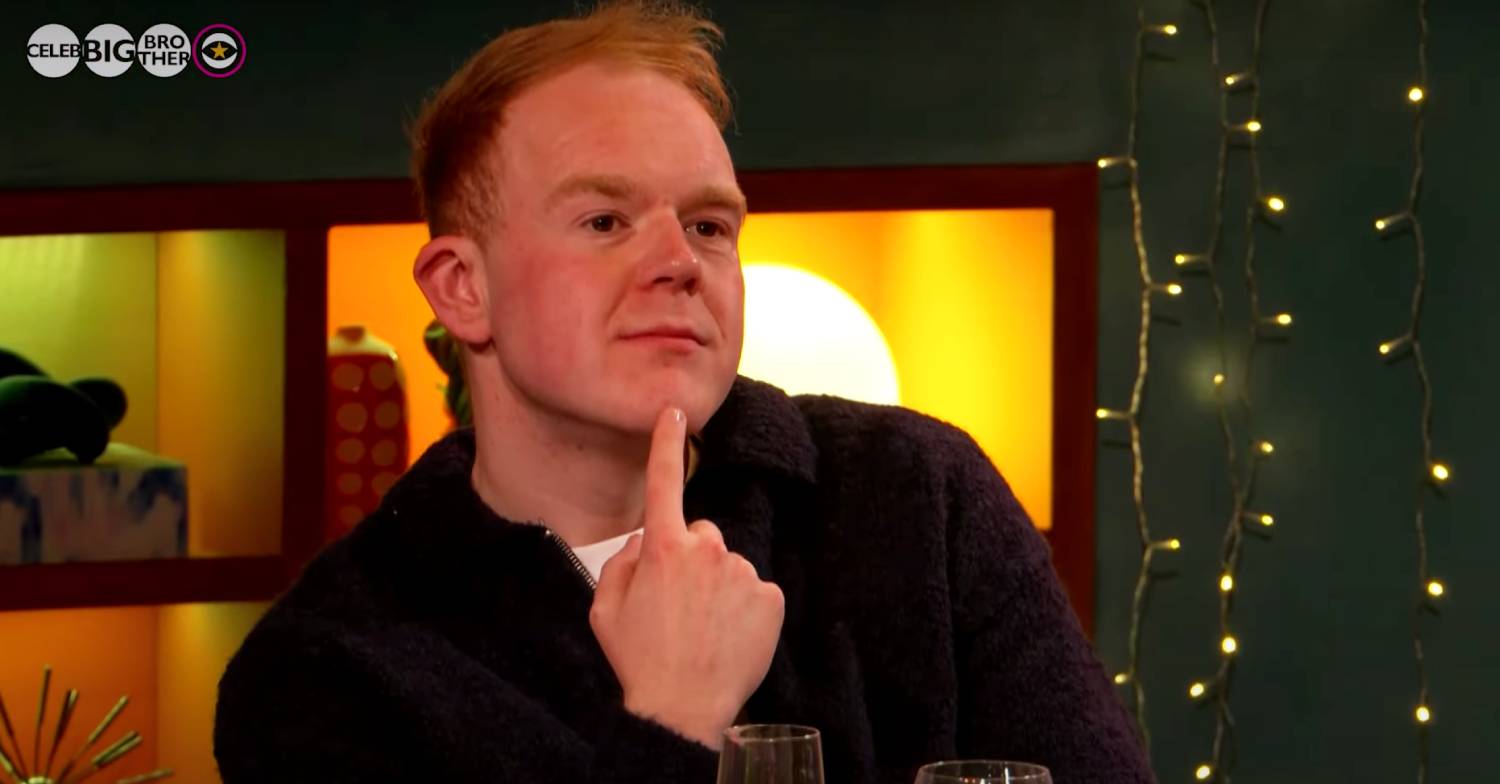 Colson Smith fingers his chin