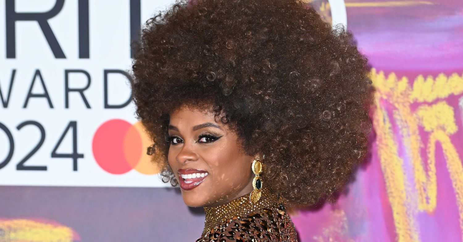 Fleur East smiling on the red carpet