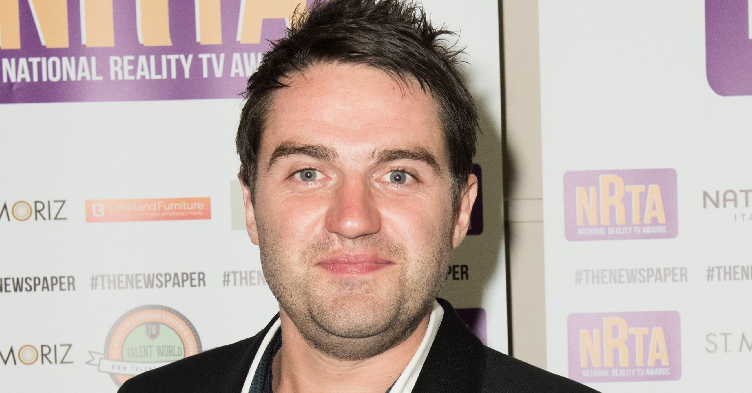 Gogglebox star George Gilbey smiling at event
