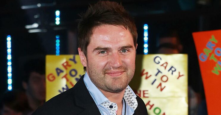 Gogglebox star George Gilbey smiles