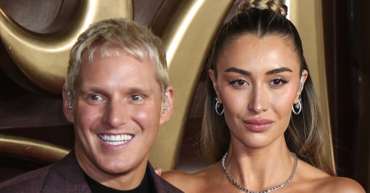 Jamie Laing smiling beside Sophie Habboo at Wonka premiere