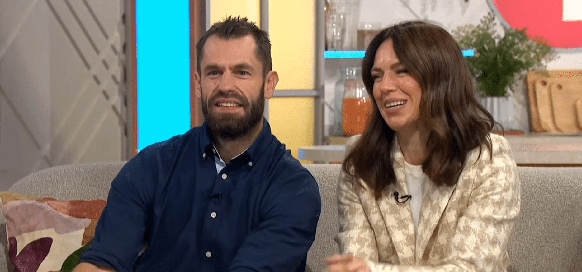 Kelvin Fletcher and wife Liz smiling on Lorraine (Credit: ITV)