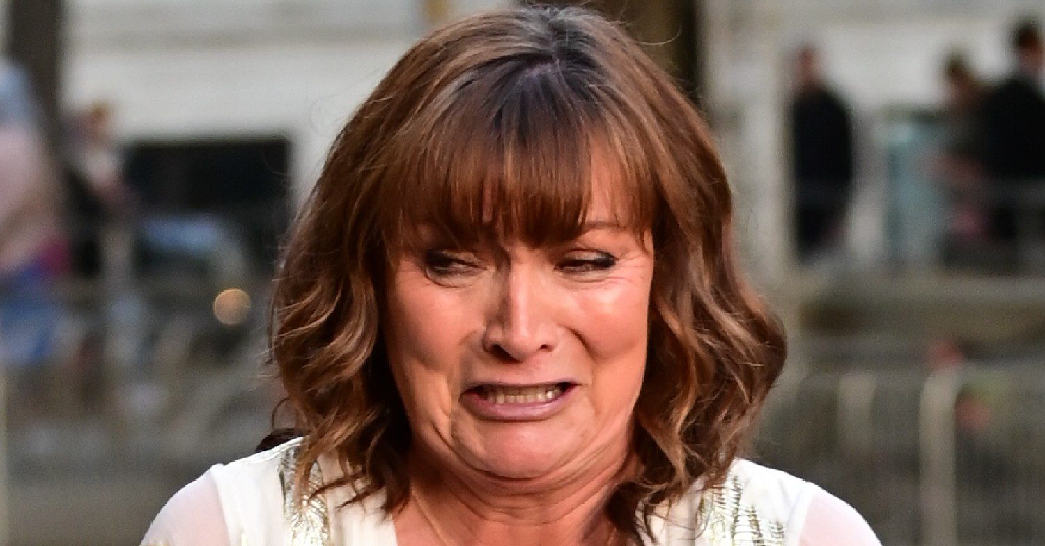Lorraine Kelly looking upset in the street